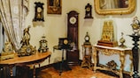 grandfather clock beside white table