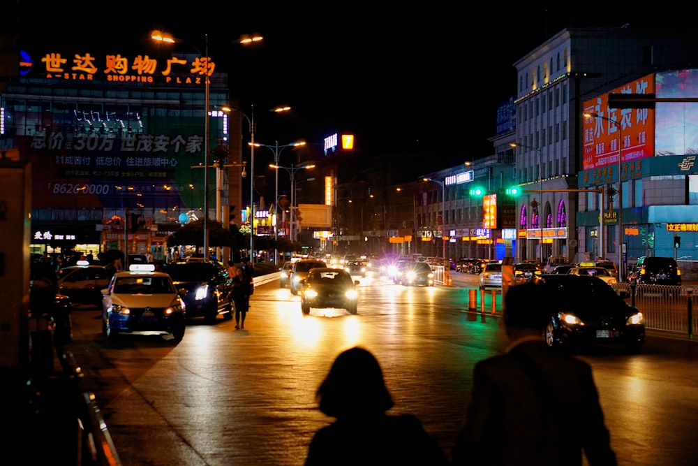 vehicles on road at night