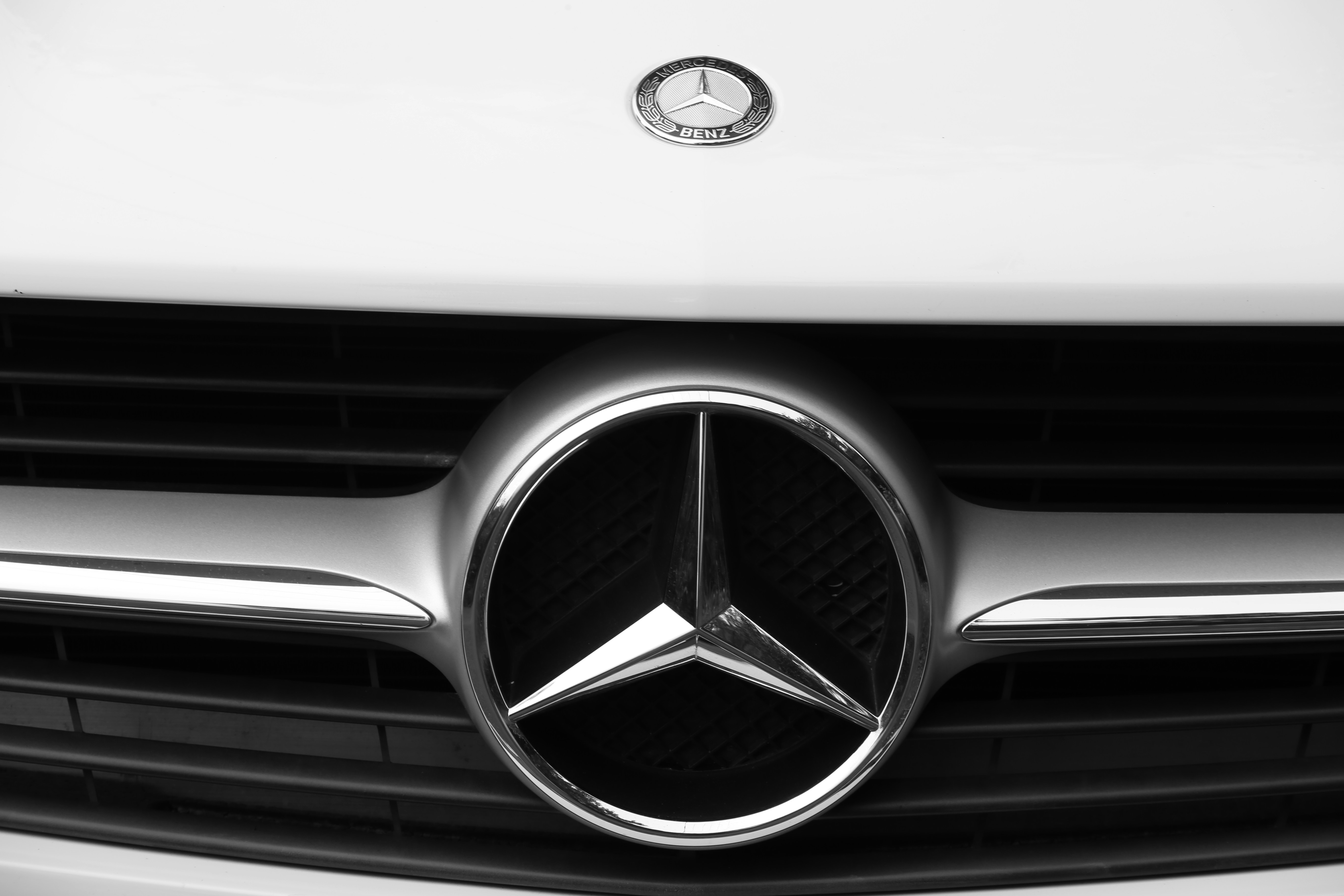 Mercedes-Benz three-pointed star logo emblem