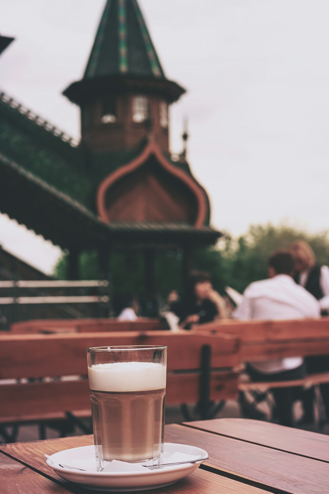 half-filled clear drinking cup