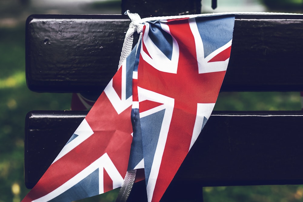 flag of UK on black wooden bench