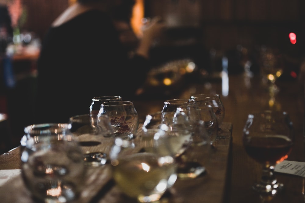 selective focus photography of wine glasses