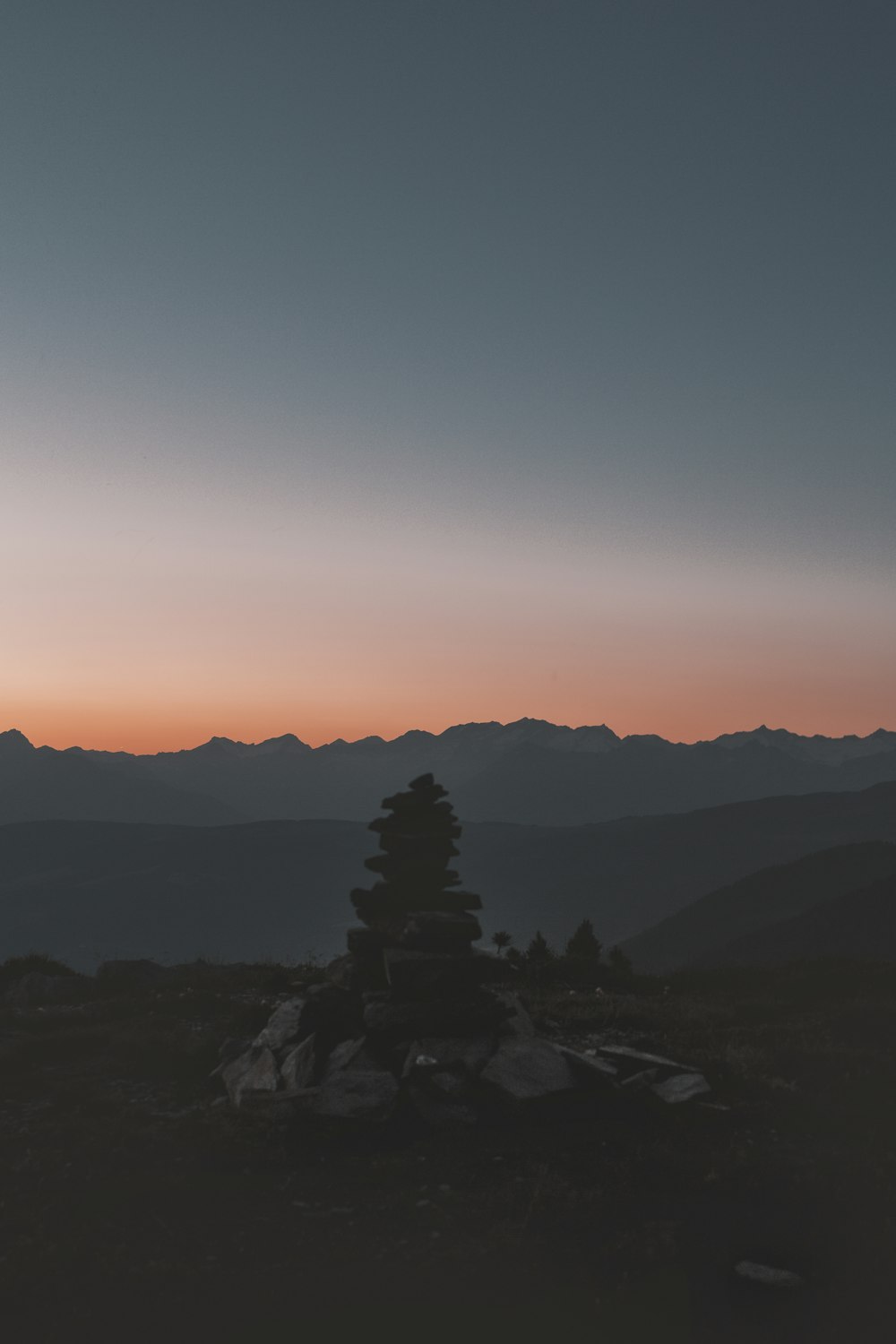 a black and white photo of a mountain range