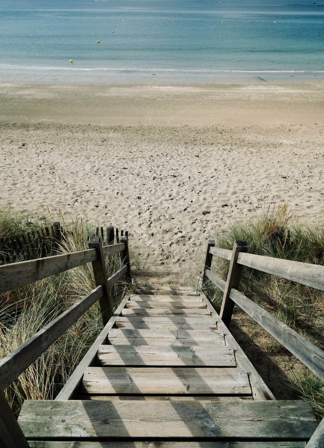 wooden stair on shore