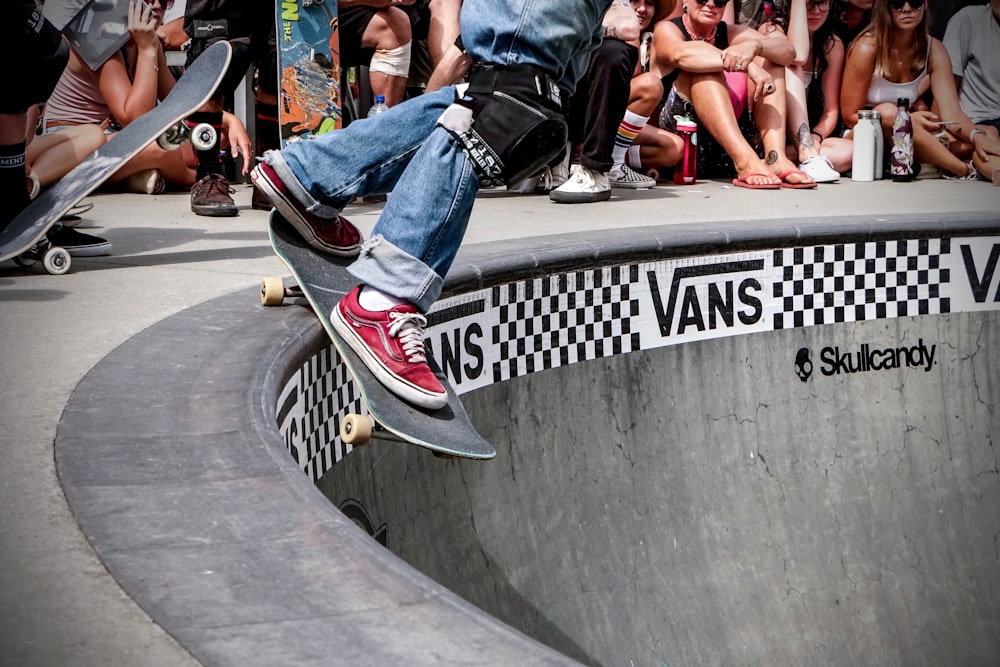 man playing skateboard on skateboard arena