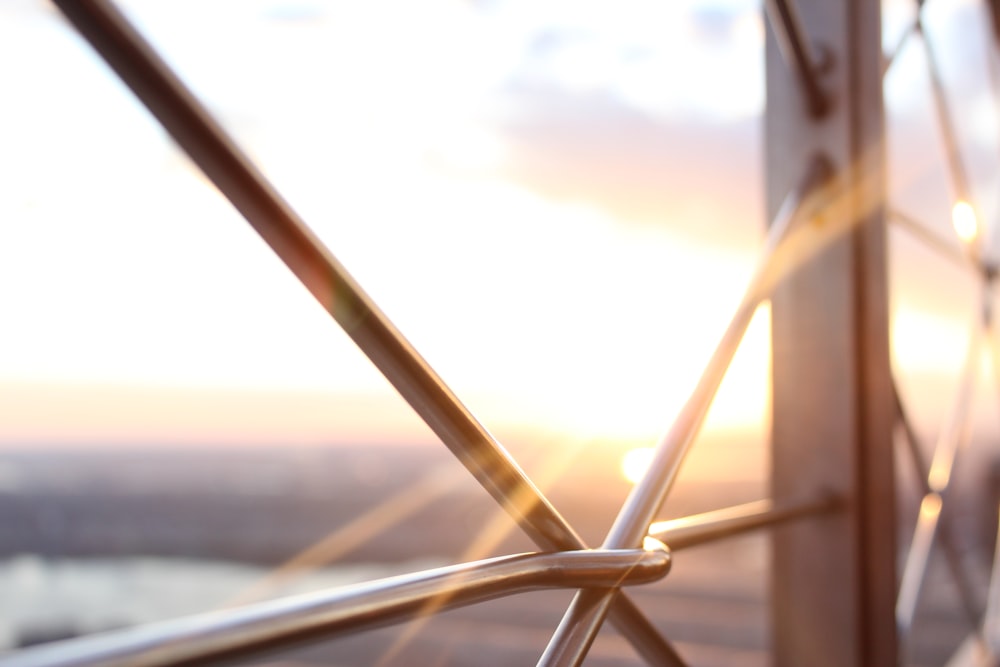 gray stainless steel railings during golden hour