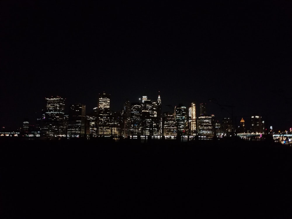 a view of a city at night from across the water