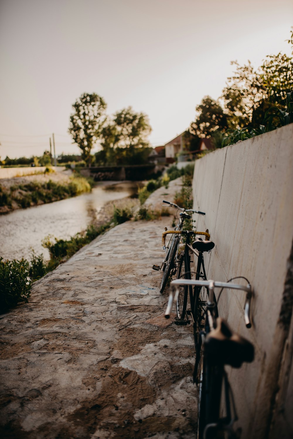 bicycle parked beside wall