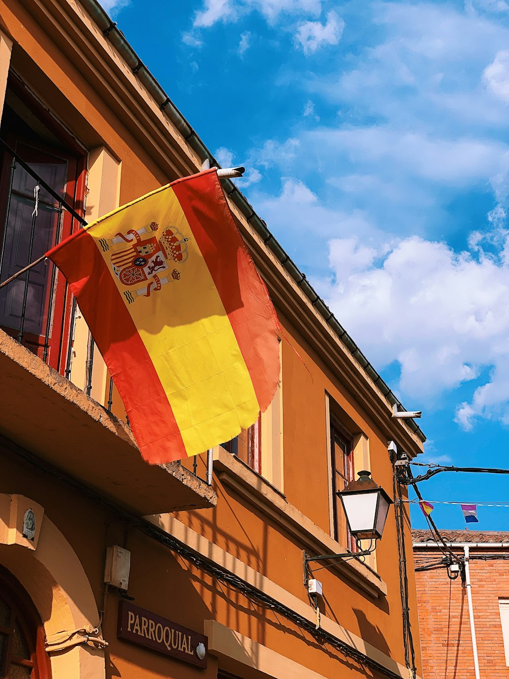 commercial building with flag of Spain