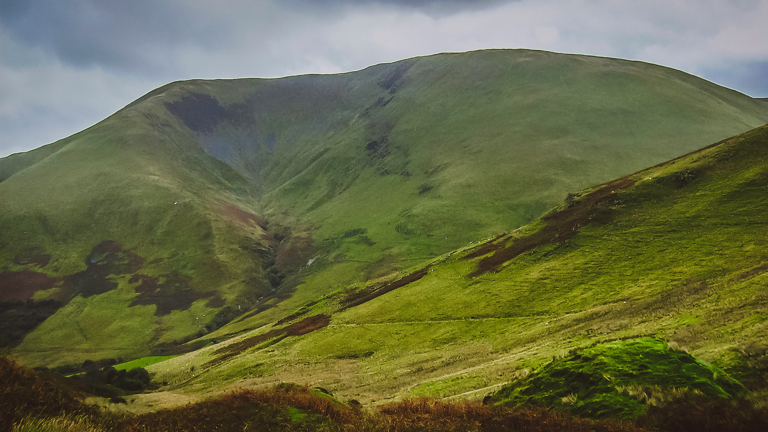 landscape photography of green mountain