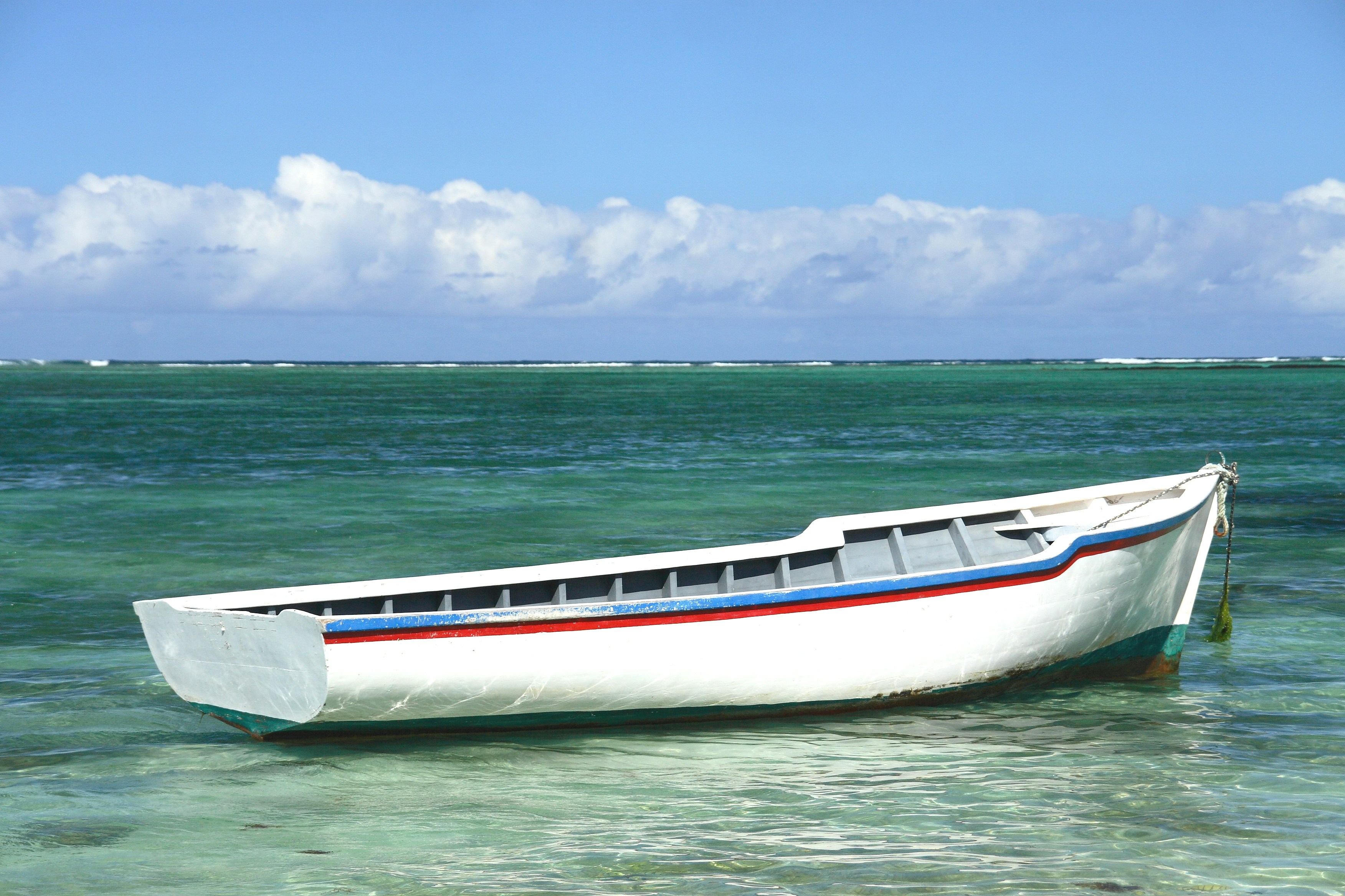 Mauritius fishing boat, blue ocean, island living