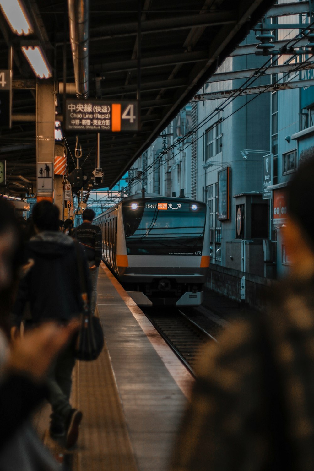 people standing in station