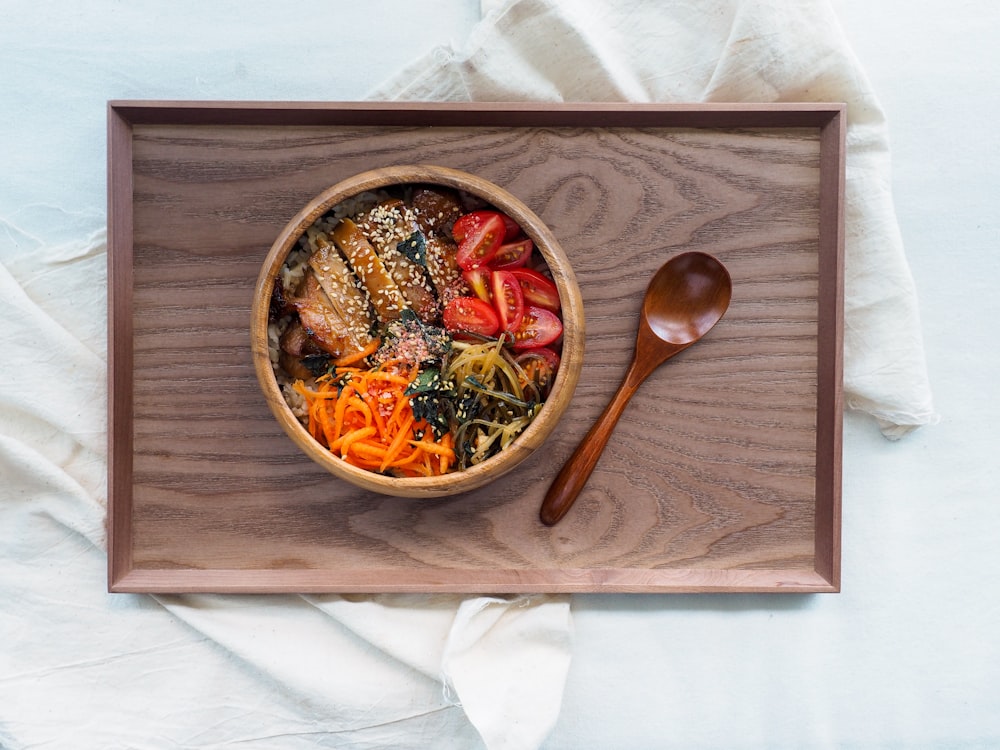 dish on brown wooden bowl