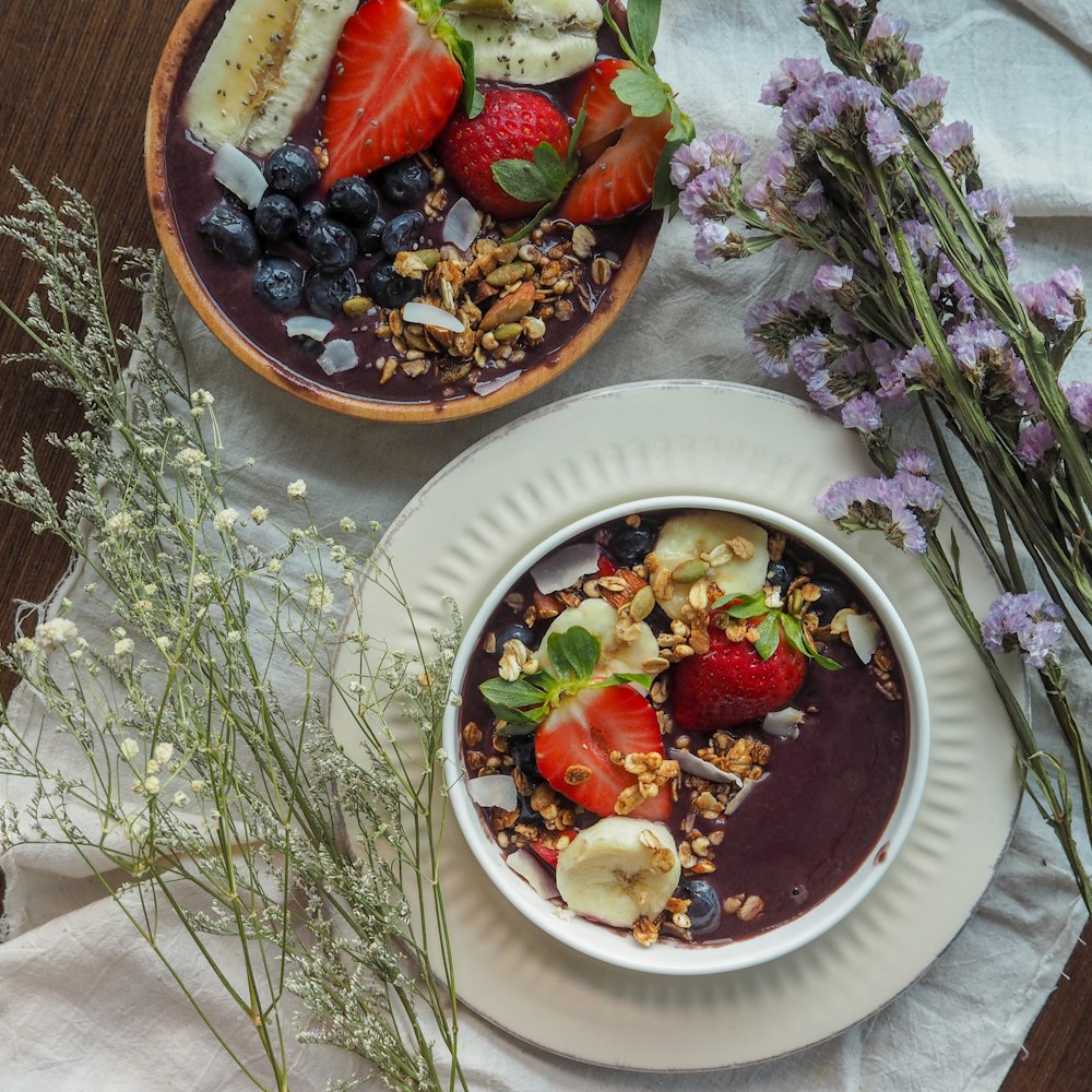 assorted fruits in white ceramic bowl