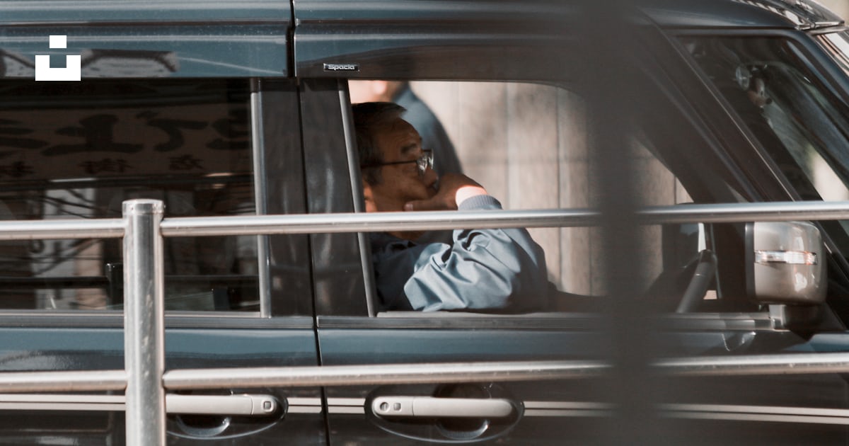 Shallow focus photo of man riding car photo – Free Grey Image on Unsplash