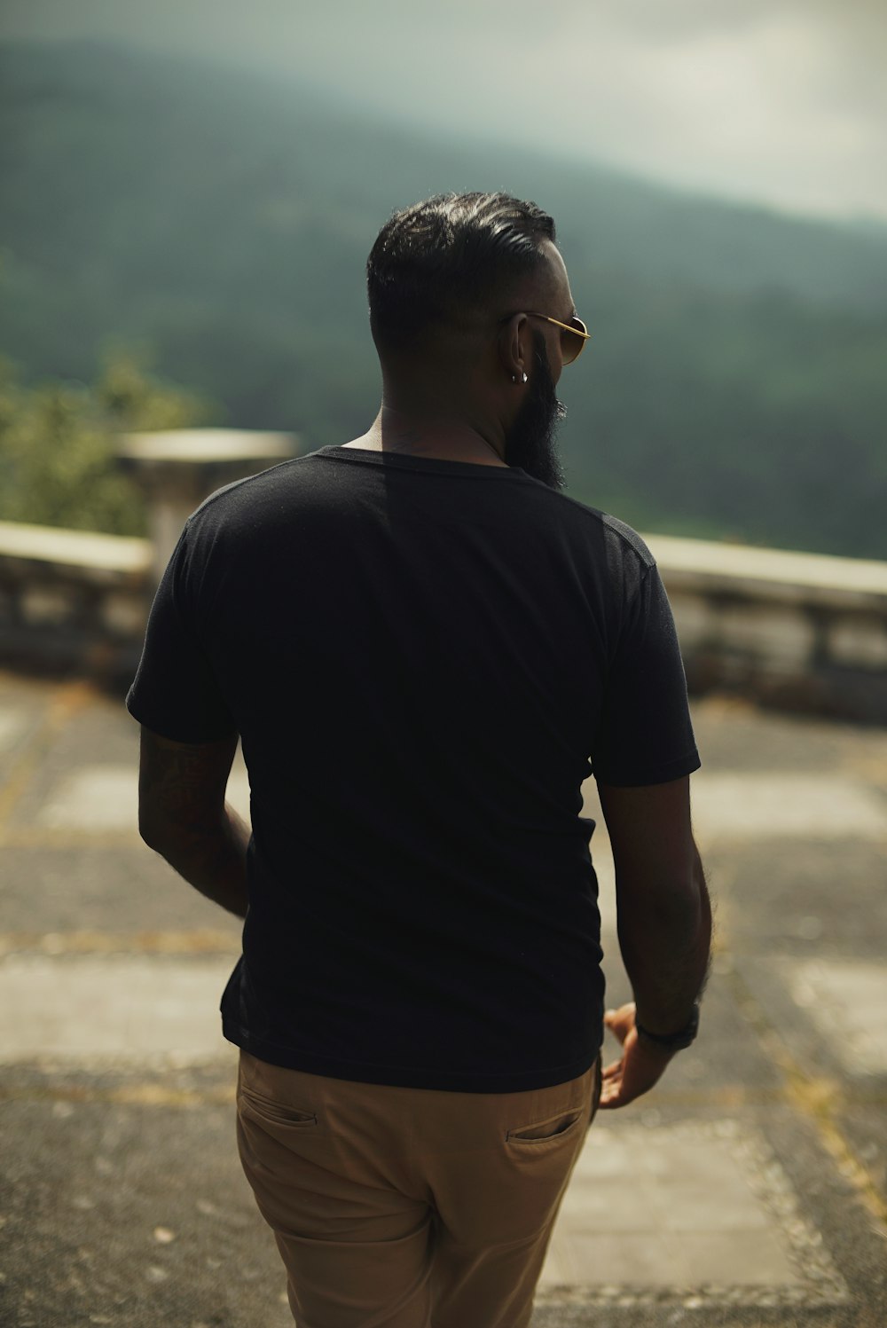 man standing on selective focus photography