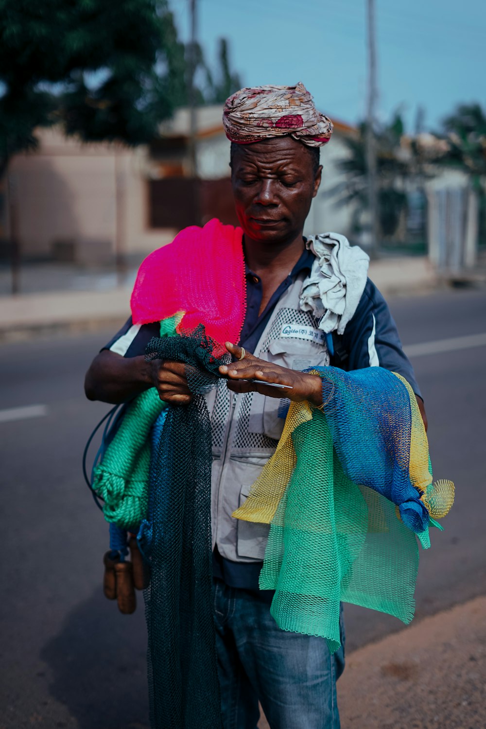 man carrying nets