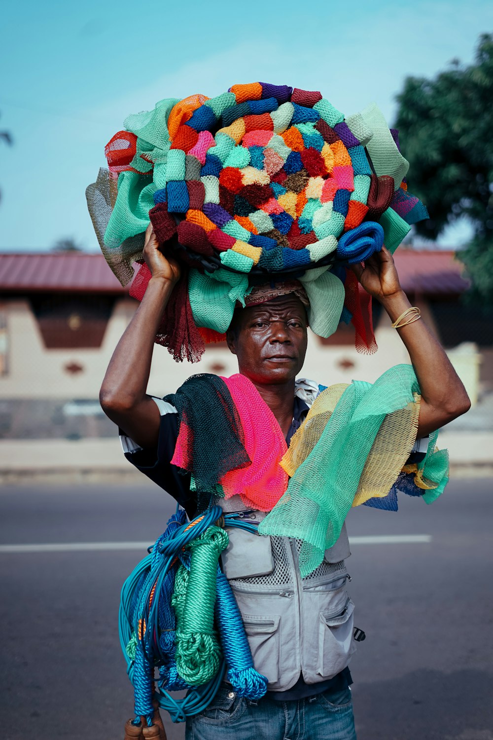 shallow focus photography of woman carrying fabric