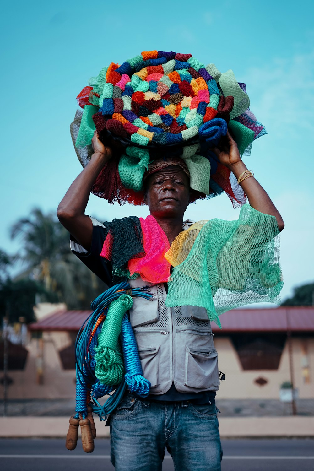 person carrying ropes