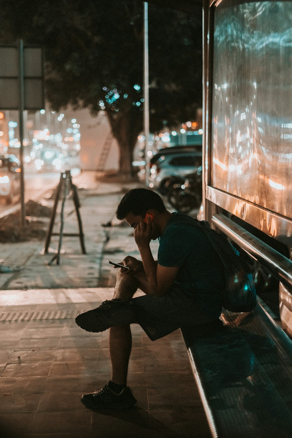 man sitting on bench