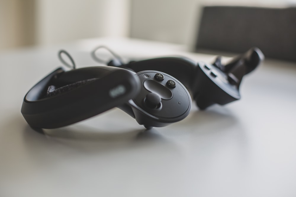 two game controllers on table