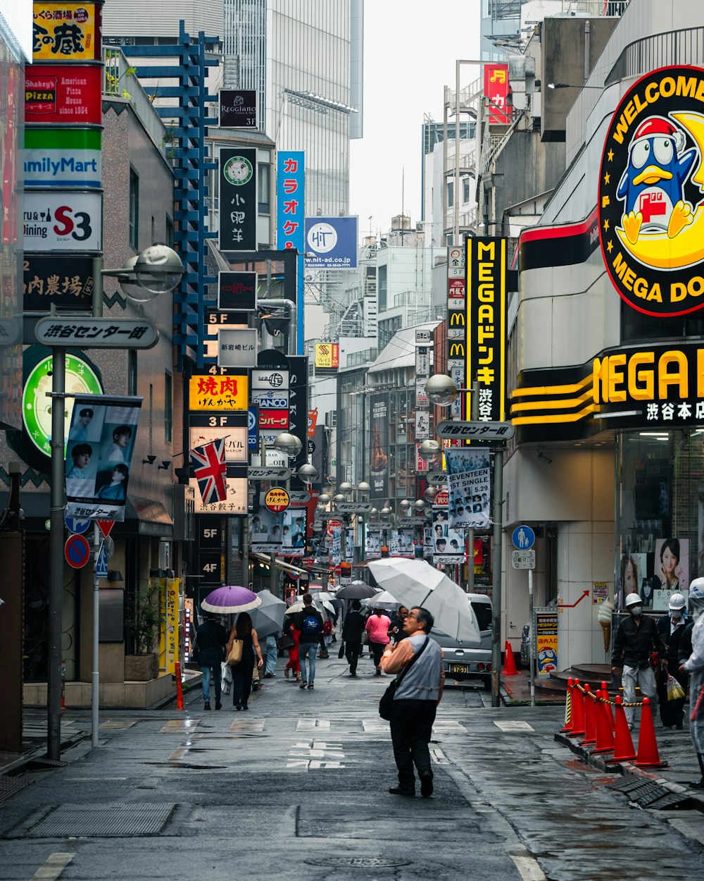 people walking near high-rise buildings during daytime