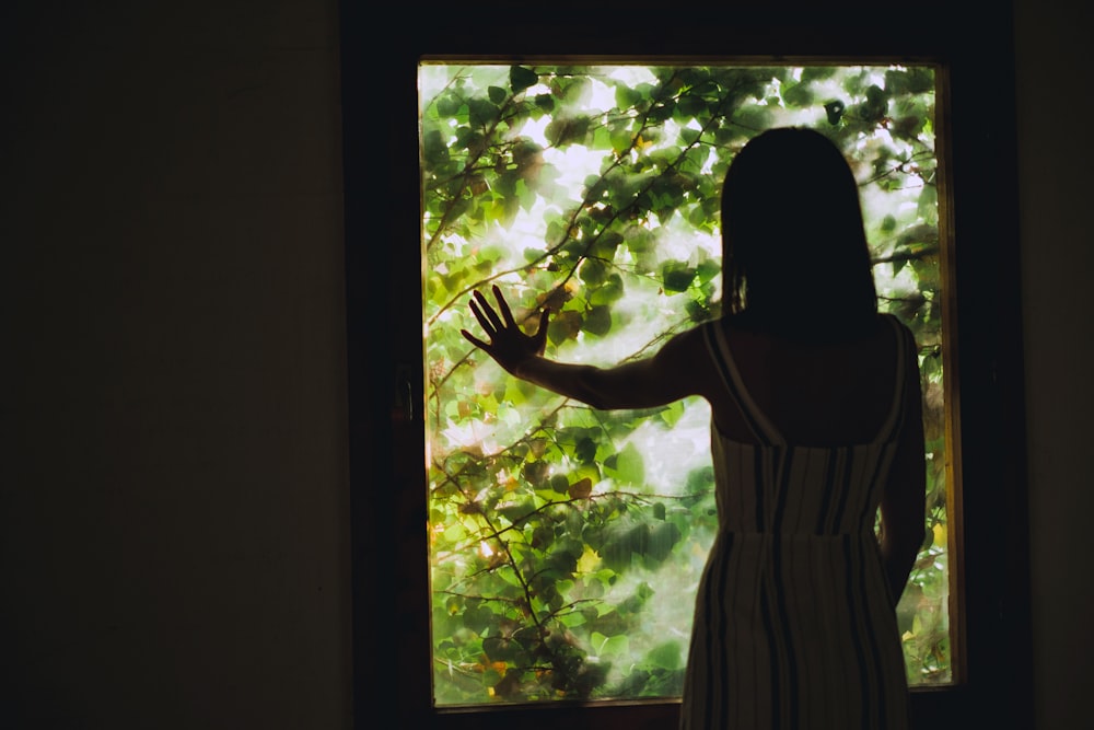 woman near window