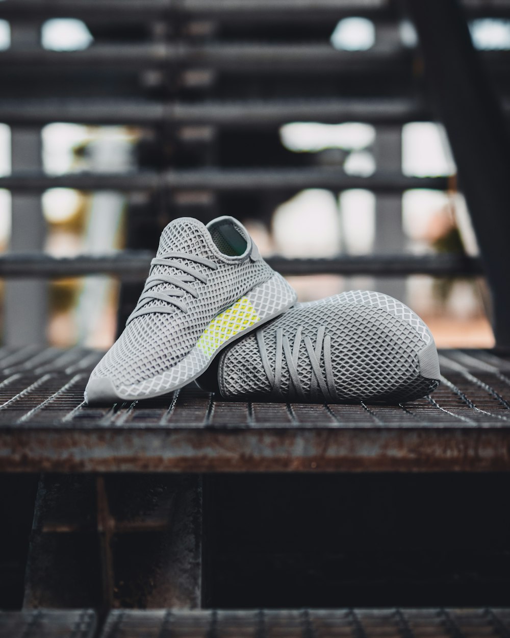 pair of grey shoes on stair