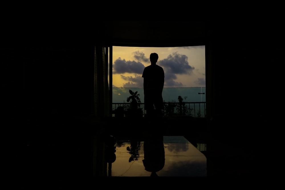 silhouette of person standing
