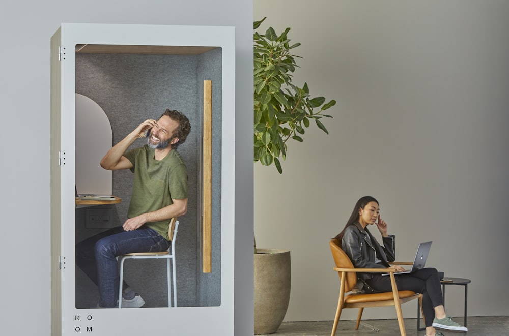 woman sitting on brown armchair