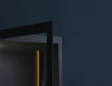 Close-up of monochrome design elements with navy blue highlights.