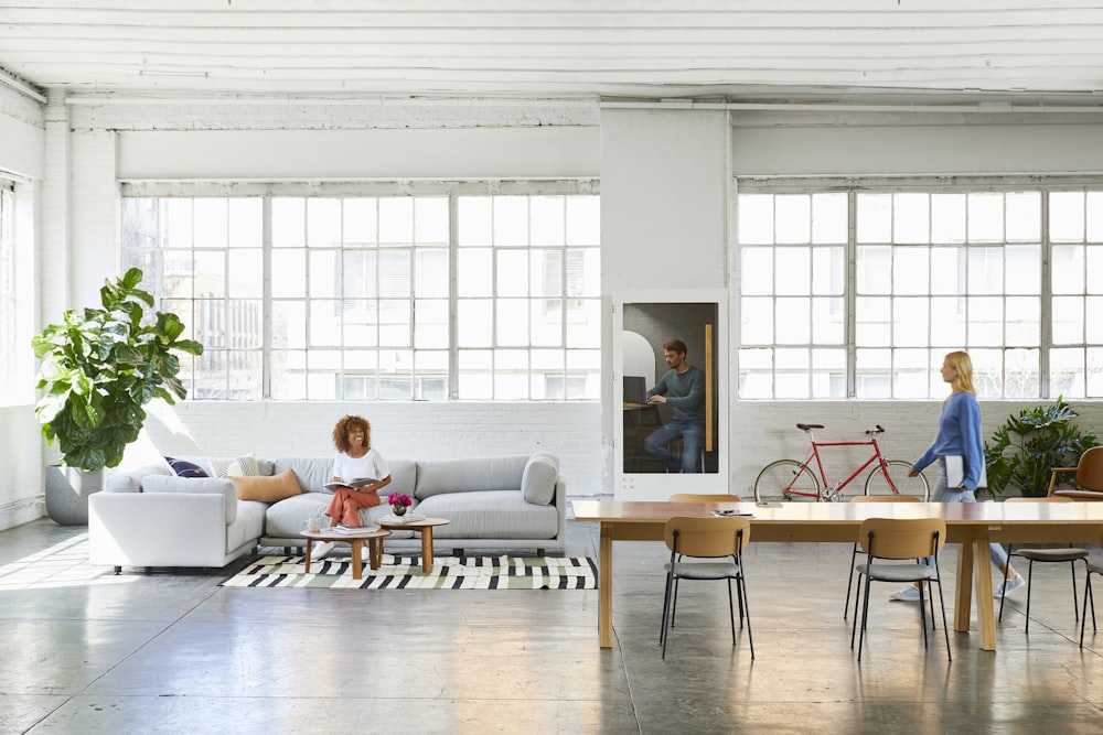 two women in an open space room