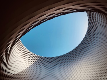 round white concrete building rooftop view