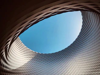 round white concrete building rooftop view