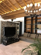 Cozy living room with a custom TV panel and ambient lighting.