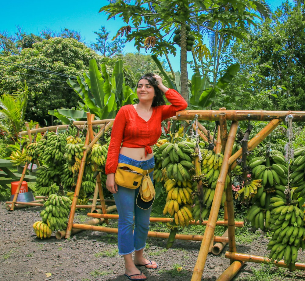 woman standing smiling on focus photography