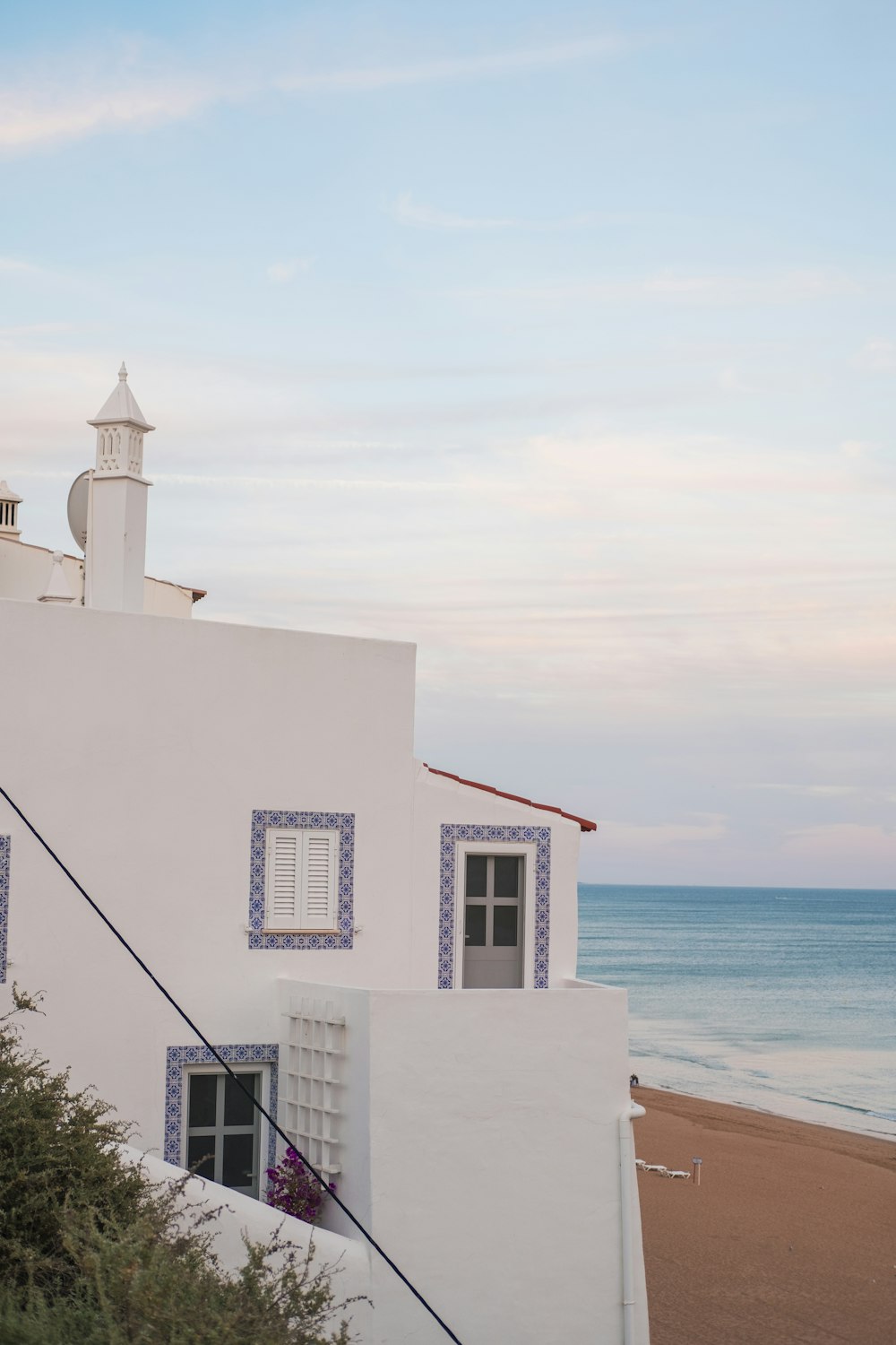 white concrete building near ocean