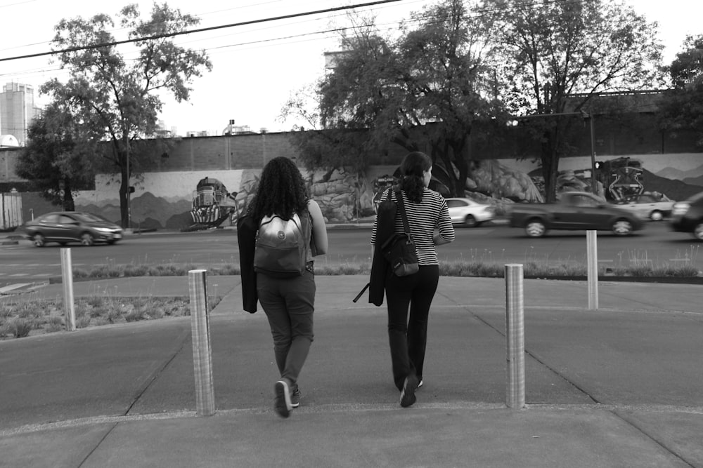 two women walking side by side