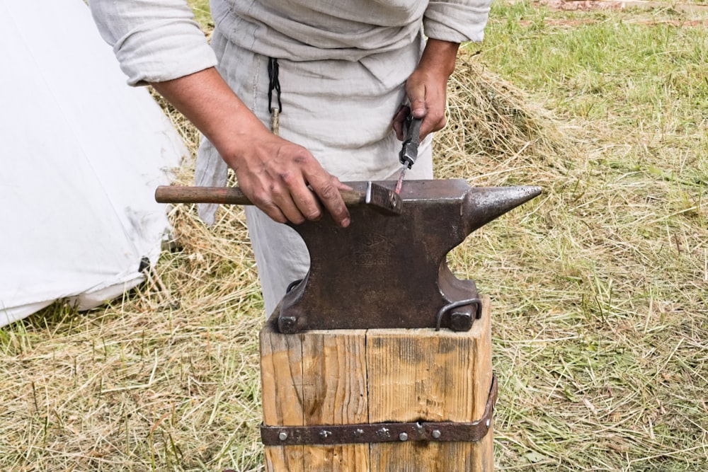 locksmith hammering in an anvil