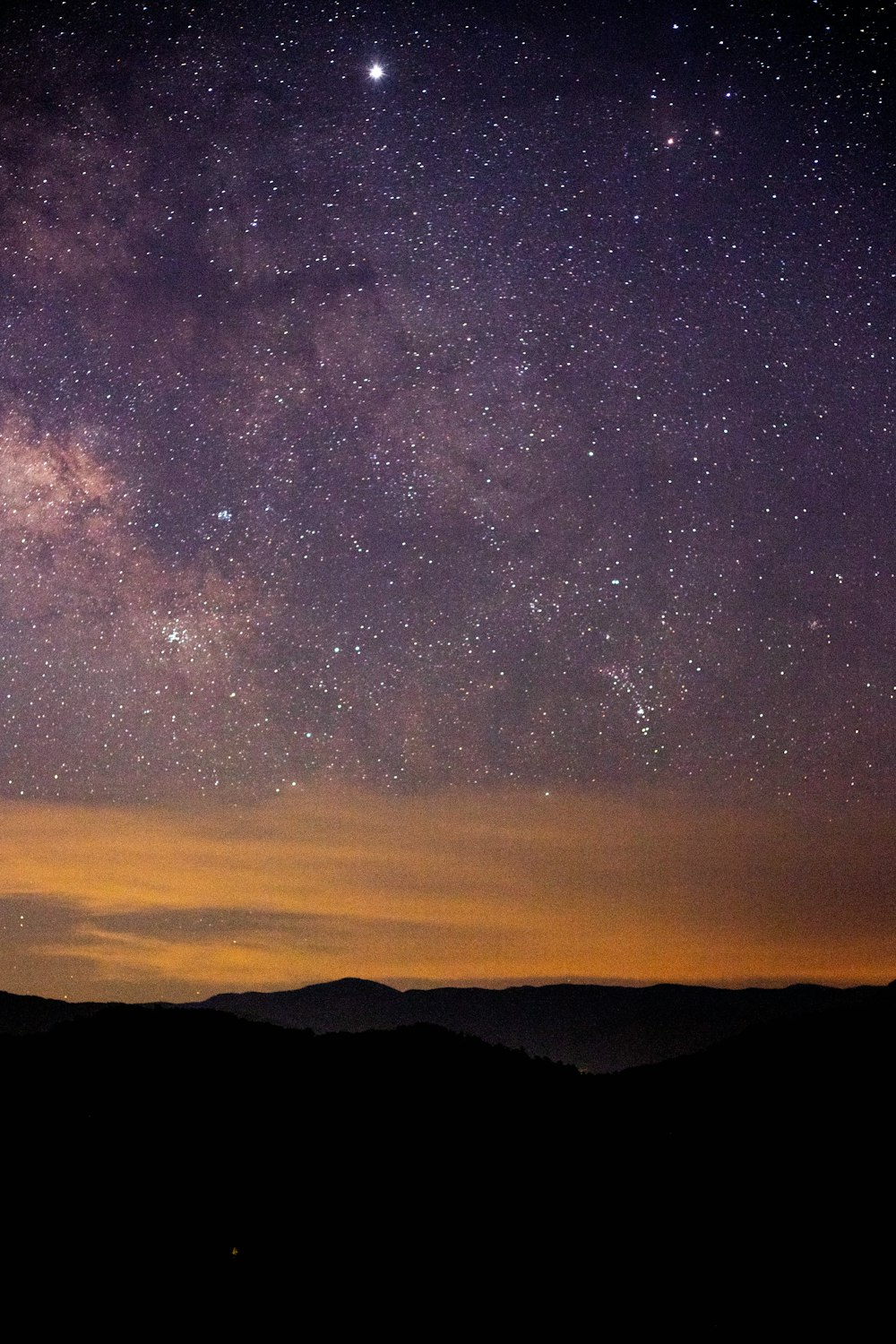 silhouette of mountain during nighttime