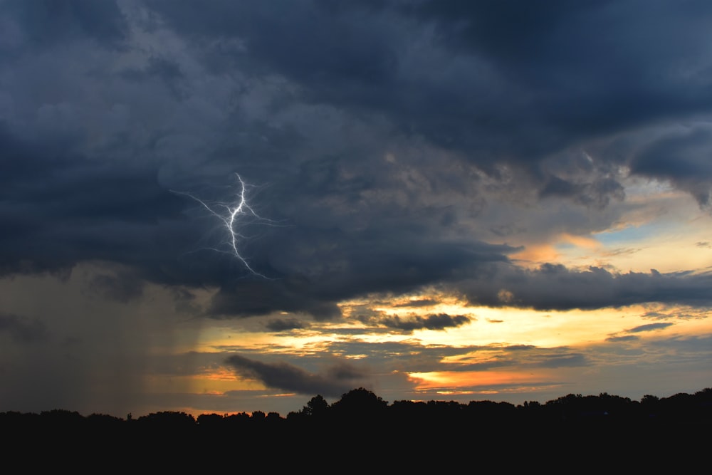 lightning under nimbus cloud