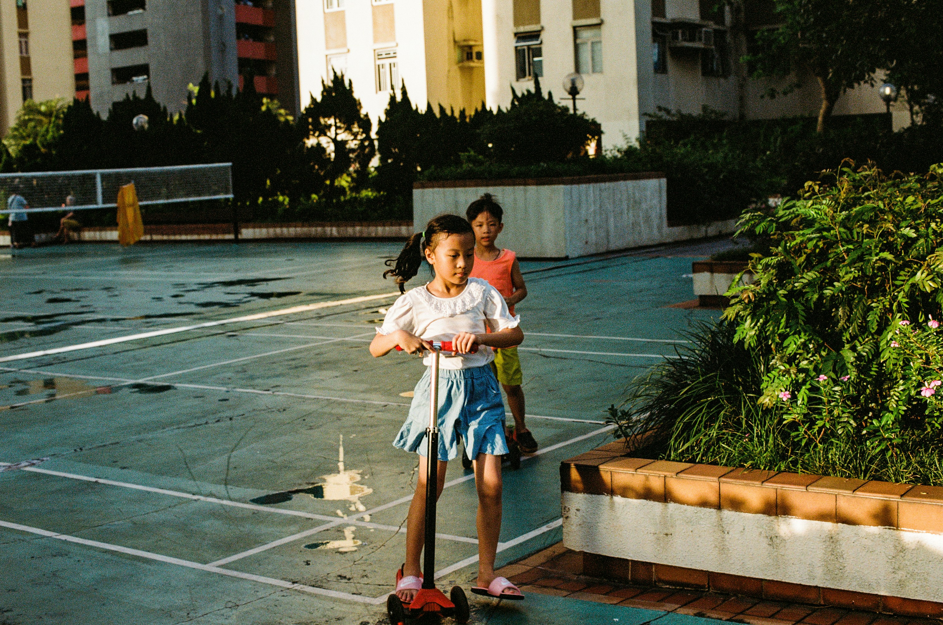 girl using kick scooter