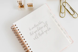 white spiral notebook