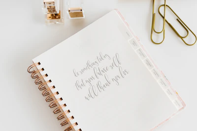 white spiral notebook
