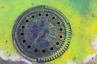 A custom-made steel cover reflecting intricate detailing and design.