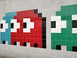 blue, red, and green Pac-Man wall painting