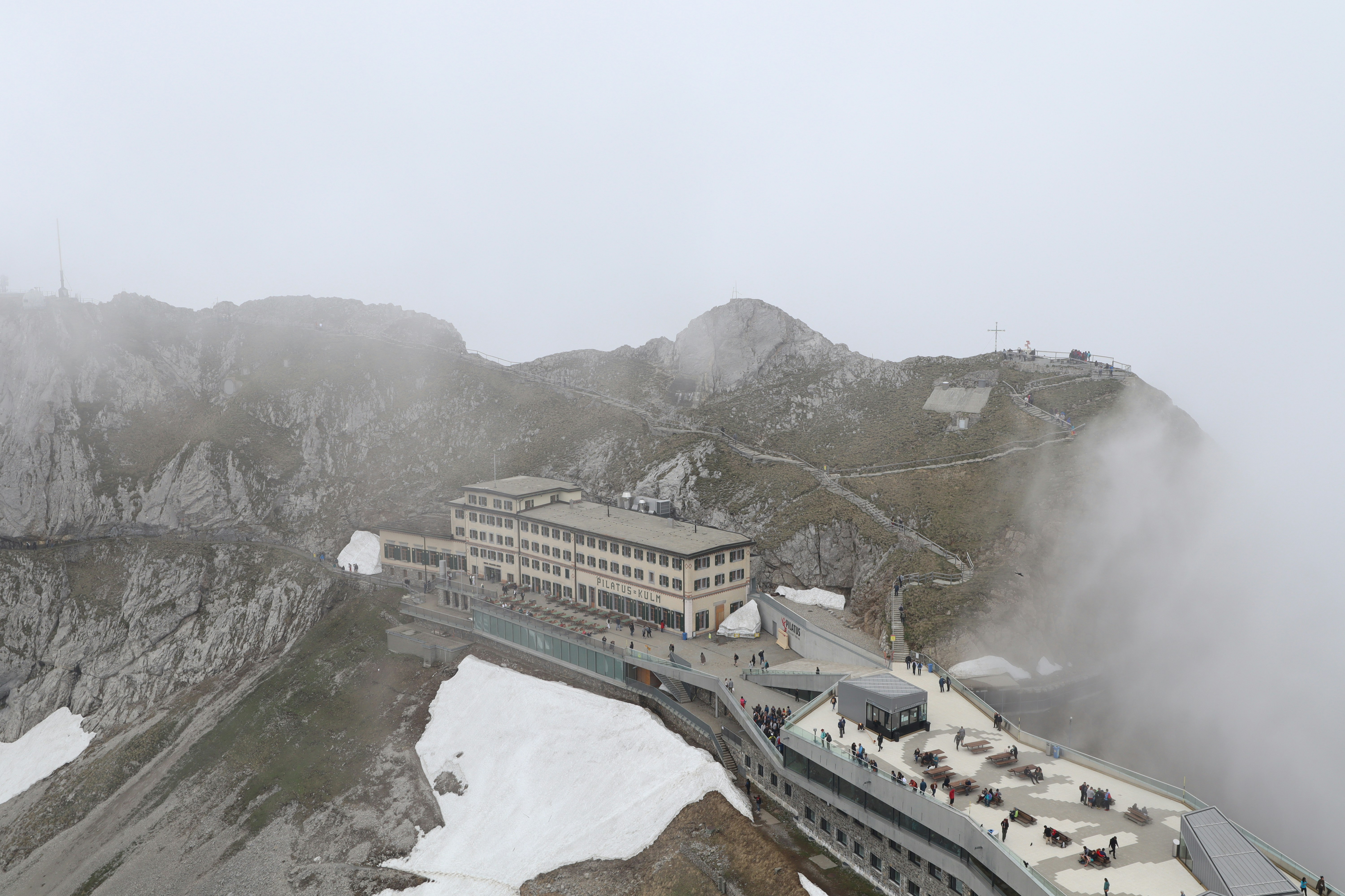 aerial photography of gray building on mountain during daytime