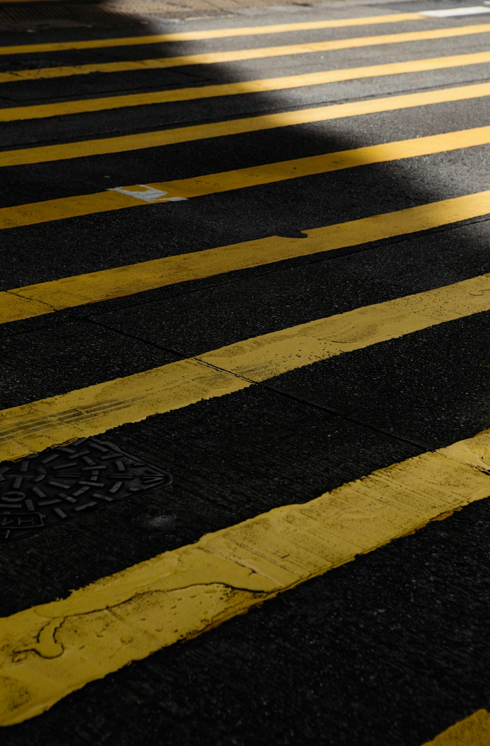 black and yellow pedestrial lane