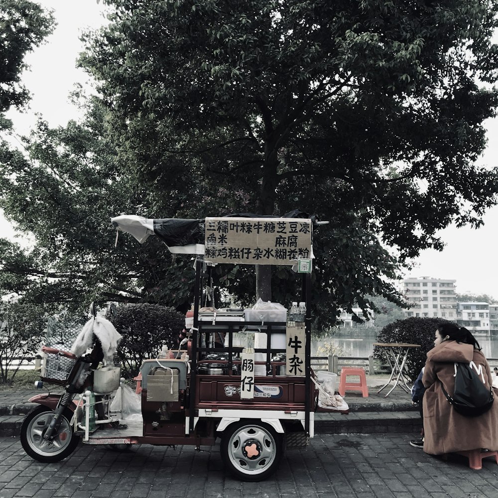 black and red trike outdoor during daytime