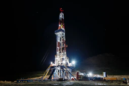 red and white tower during nighttime